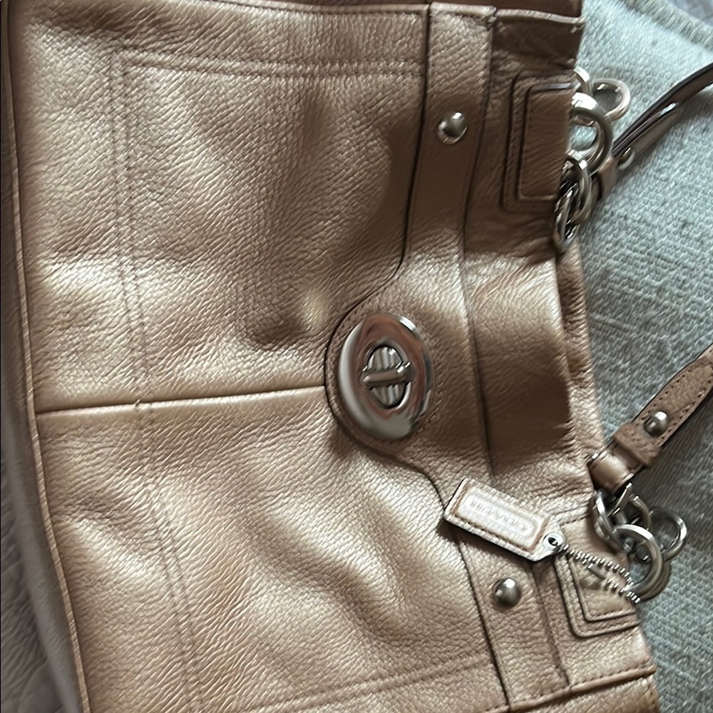 Coach Tan Leather Shoulder Bag with Structured Design